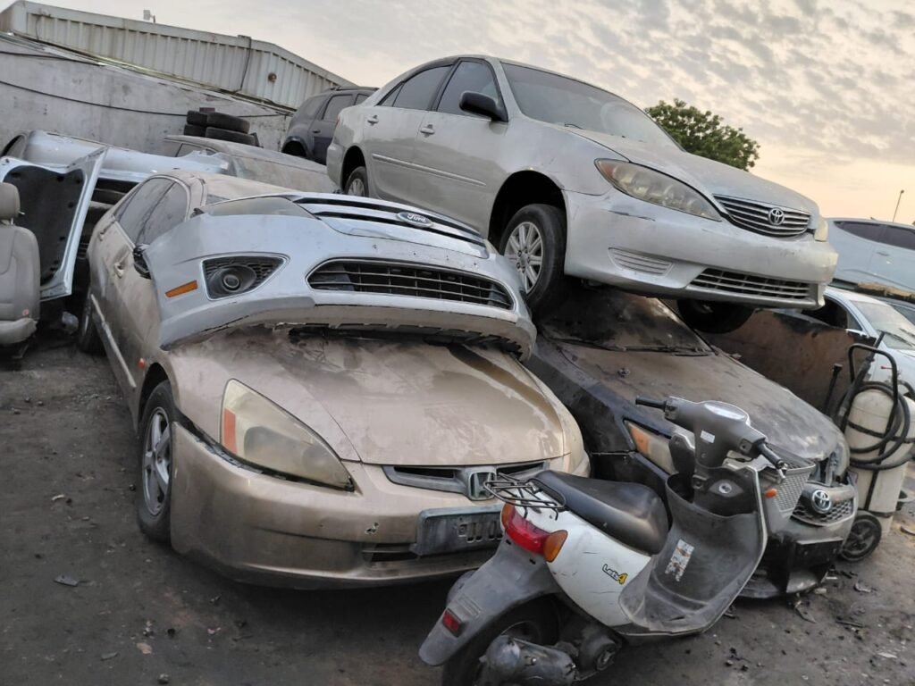 Accident damaged Ford Fusion scrap car ready for pickup in Ajman